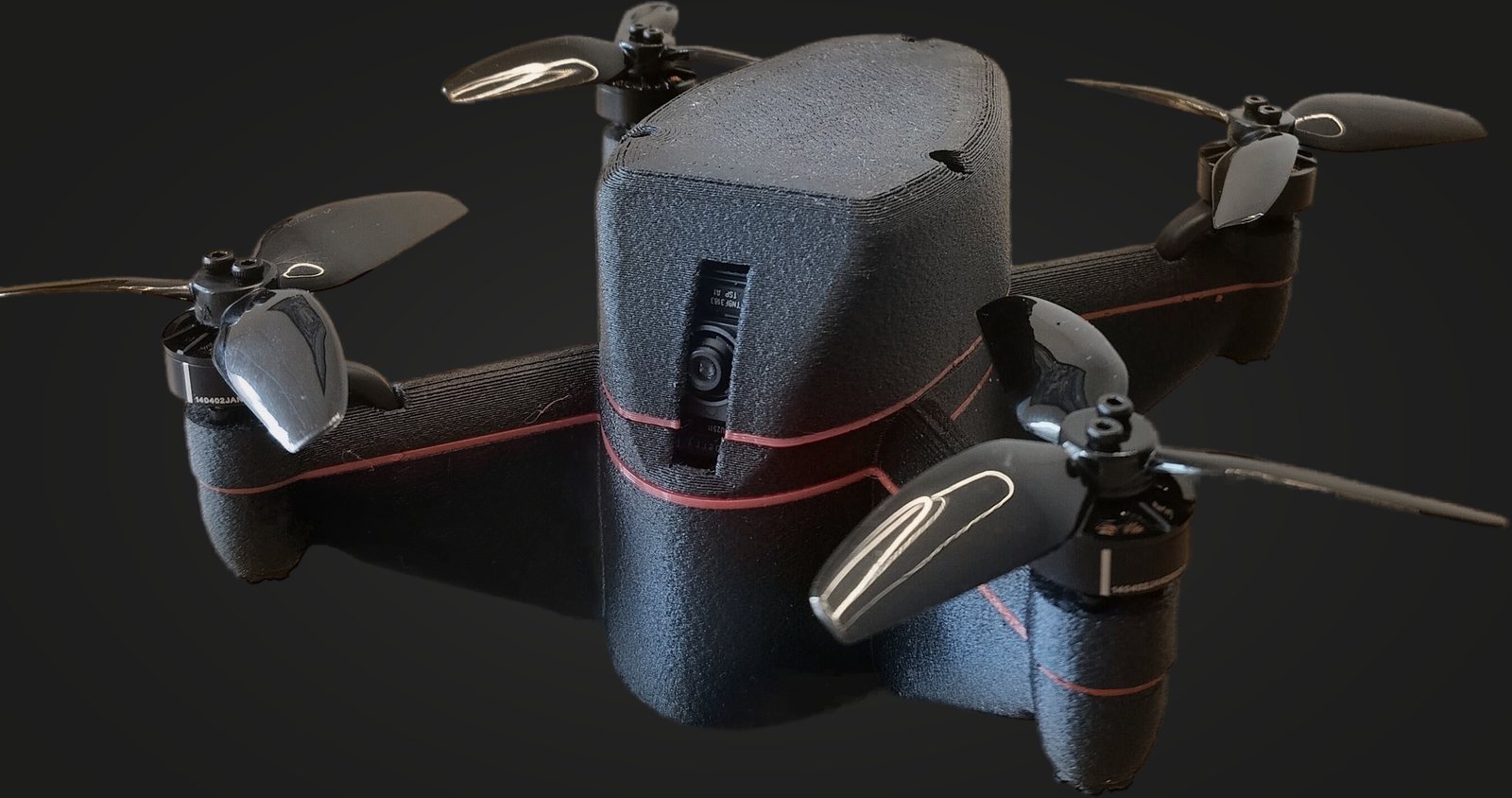 BeeHive interceptor drone, a compact black quadcopter with a forward-facing AI camera